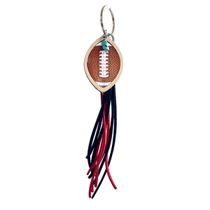 Porte-clés rugby en cuir marron avec pompon bicolore et perle turquoise décorative