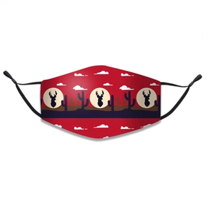 Detail of red Christmas face mask featuring reindeer and cactus print with ear loops