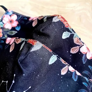 Three-layer cotton face mask with floral print and a built-in nose bridge strip