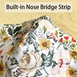 Three-layer cotton face mask with floral print and built-in adjustable nose bridge strip