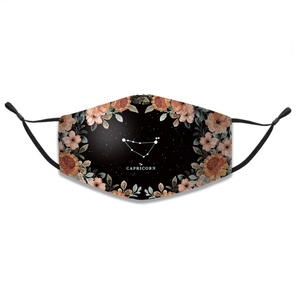 Detail of Capricorn zodiac face mask with floral print and adjustable ear loops