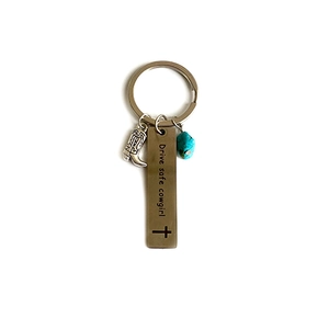 Western cowboy boot keychain with turquoise bead and Drive safe cowgirl metal plate