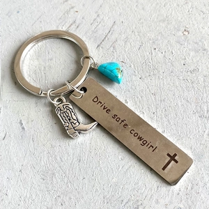 Western style cowgirl keychain with cowboy boot charm, turquoise bead and drive safe tag
