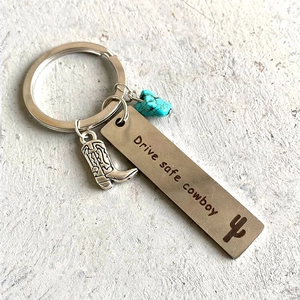 Western cowboy keychain with turquoise bead, metal boot charm and Drive Safe metal tag