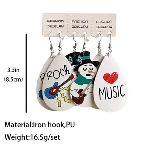 Detail showing the 3.3in height dimension and rock music themed PU leather earrings