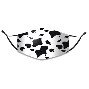 Detail of cow print cotton mask with black adjustable ear loops for a custom fit