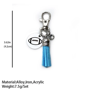Détails du porte-clés football américain avec pompon bleu clair et dimensions