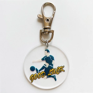Acrylic football soccer player keychain with Good Luck text on a silver metal lobster clasp