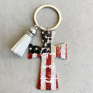 Western cowboy cross keychain with US flag pattern and white leather fringe tassel