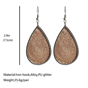 Boucles d'oreilles gouttes pailletées champagne avec bordure tressée argentée et crochet fer