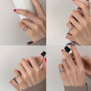 Minimalist silver plated rings collection featuring smiley and geometric open designs