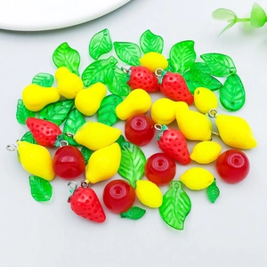 Colorful acrylic fruit pendants including strawberry and lemon for DIY jewelry making