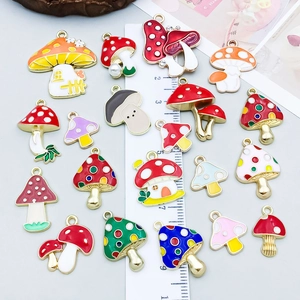 Amuletos de setas de colores en esmalte para joyería DIY con regla de medición