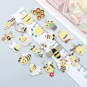 Gelbe Emaille Bienen und Honigglas Anhänger für DIY Schmuck mit Lineal für Größenvergleich