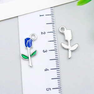 Detailed view of rose enamel charm with blue petals showing 3.2cm size measurement