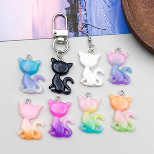 Glittery resin cat pendants in gradient colors for DIY necklaces and keychains