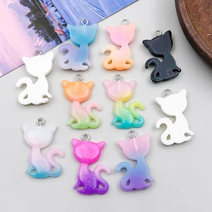 Detailed view of ten colorful glitter resin cat charms with silver metal rings for DIY jewelry