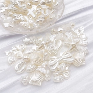 Vue détaillée de perles ABS blanc perle en formes de papillon et de coquillage pour le DIY