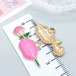 Macro shot of rose flower enamel pendants showing front and back with size measurements