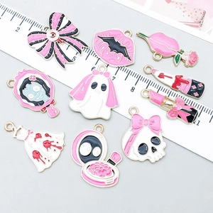 Pink and black gothic enamel charms in skull and ghost designs for DIY jewelry making