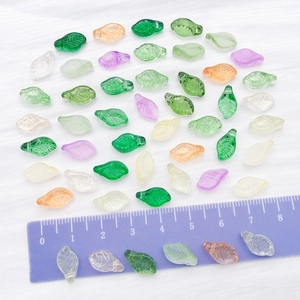 Mix of colorful transparent glass leaf charms for DIY bracelets and necklace jewelry