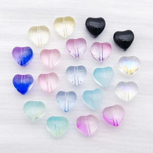 Colorful heart-shaped glass beads for DIY jewelry making in various gradient tones