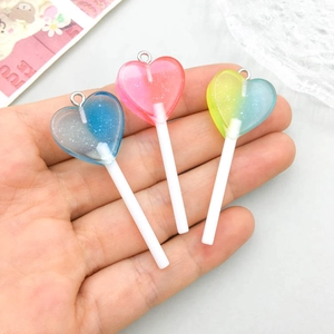 Three gradient resin heart lollipop charms with glitter and metal rings for DIY jewelry
