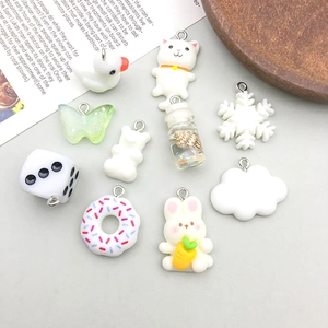 Assorted DIY resin pendants including animals and clouds with silver metal hanging loops