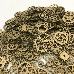 Detailed top view of mixed steampunk bronze alloy gears for DIY jewelry making
