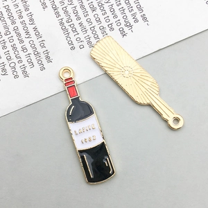 Macro detail of wine bottle charm with Lafite 1982 print and radial sunburst texture