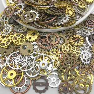 Close-up of mixed steampunk metal gears and mechanical parts for DIY jewelry making