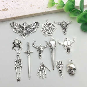 Set of 12 vintage silver gothic skull pendants for DIY jewelry and dark art accessories