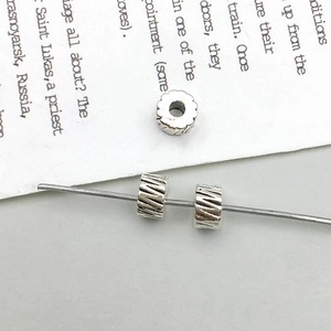 Macro di perline distanziatrici in lega argentata con trama a spirale per gioielli DIY