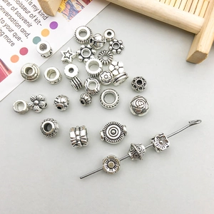 Assorted vintage silver alloy spacer beads and pendants for DIY jewelry making