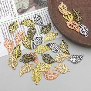 Detailed hollow leaf charms in multiple metal finishes for DIY jewelry making and crafts