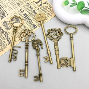 Vintage bronze alloy key pendant set with steampunk gears and seahorse designs for DIY crafts