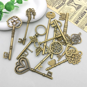 Vintage bronze alloy skeleton keys set with heart and wing motifs for DIY jewelry making