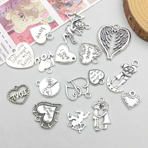 Set of antique silver alloy heart and wing charms for DIY jewelry making crafts