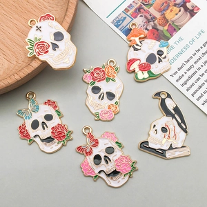 Halloween cartoon skull charms in gold alloy with colorful drip oil for DIY jewelry making