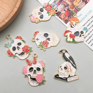 Set of 6 Halloween enamel skull charms with rose, butterfly and raven for DIY jewelry