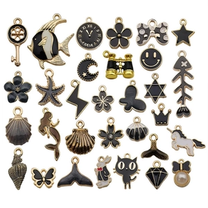 Mix of 31 black enamel ocean and celestial charms in gold finish for DIY jewelry
