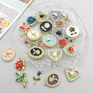 Detail of rose oil-drip alloy charms with imitation pearls and rhinestones