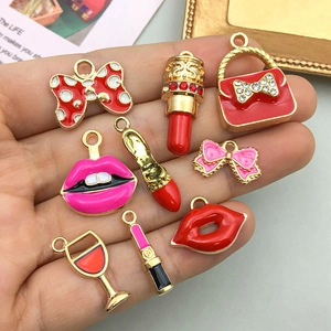 Enamel lipstick and bow charms set for DIY jewelry making in vibrant red and gold finish