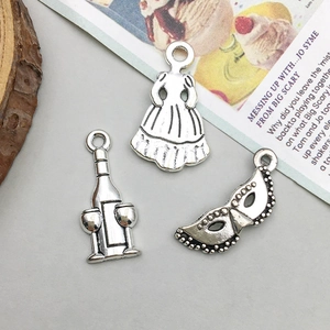Antique silver charms set featuring wine bottle glass dress and masquerade mask for DIY jewelry