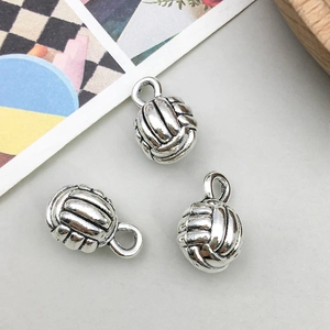 Detail of silver alloy volleyball charms with retro finish and top loop for DIY jewelry