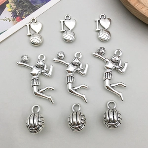 Antique silver volleyball charms set with player silhouette and ball for DIY jewelry making