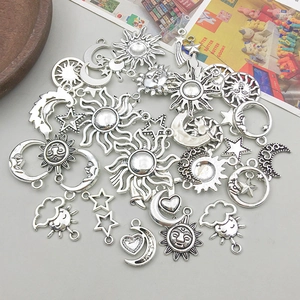 Antique silver celestial alloy pendants featuring sun moon and star motifs for DIY jewelry