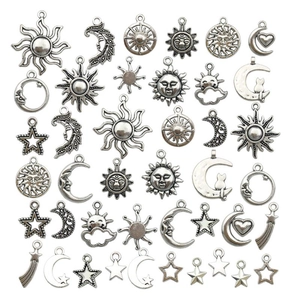 Vintage silver alloy celestial pendants with sun moon and star motifs for DIY jewelry