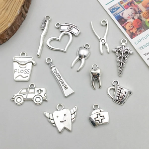 Set of 12 antique silver dental and medical charms for DIY jewelry making
