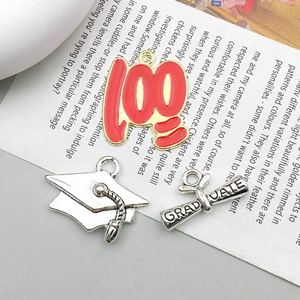Graduation alloy pendant set featuring 100 score, graduation cap, and graduate scroll charm